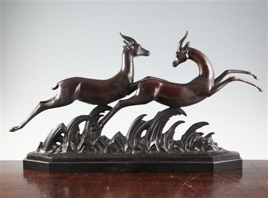 Lucien Charles Alliot (1877-1967) An Art Deco bronze group of two running gazelles, length 29in.